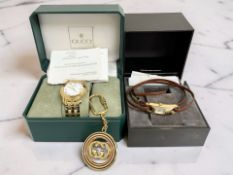 A gent's gold-plated Gucci quartz calendar wristwatch, a further lady's watch, both boxed,