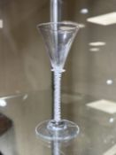 A Georgian wine glass, circa 1750, the conical bowl above a knopped,