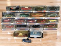 A collection of mostly boxed Dinky die cast vehicles.