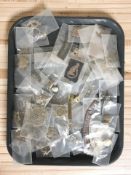 A collection of World War I and later cap badges.