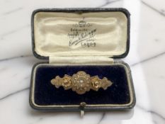 A Victorian 9ct gold split pearl brooch, width 4cm CONDITION REPORT: 2.