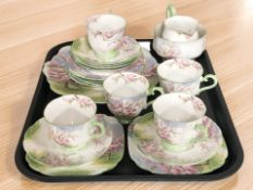 Twenty pieces of Royal Albert Blossom Time tea china.