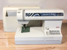 A Pfaff Stretch and Jeans 6120 electric sewing machine with lead and pedal.