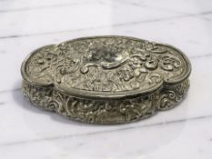 An embossed silver oval box, Birmingham 1898, width 13cm.