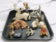 Assorted figurines including Royal Doulton Siamese casts, Bunnykins,