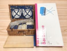 A wicker cased picnic set,