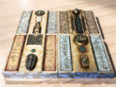 Four Mogens Leander icons, each 22 cm square.