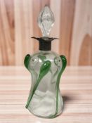 A two tone glass decanter with silver collar, height 29 cm.