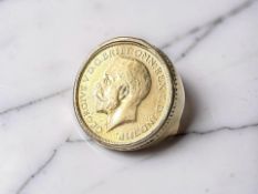 A 9ct gold signet ring with George V 1925 full sovereign,