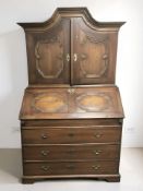 A late 19th century continental oak bureau bookcase, 119 cm x 66 cm x 199 cm.