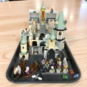 A collection of assembled LEGO Harry Potter models and figures.