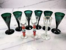 A set of six Georgian Bristol green glass wine glasses, circa 1800, height 14cm,