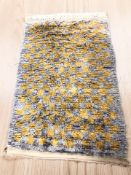 A Berber rug, Morocco, with chequerboard design, 205 cm x 134 cm.