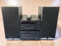 Two NAD CD receivers C715DAB, with remote, and a pair of Dali speakers.