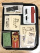 A group of antique postcards and silks, boxed Cross & Sheaffer pens,
