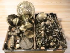 A quantity of brass wares including various wall sconces, dishes and vessels, etc.