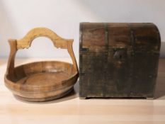 A wooden domed bottle chest, width 36 cm, and a wooden basket.