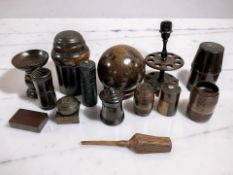 A group of treen to include dice shakers, a pipe rack, sphere, match boxes,