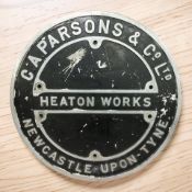 A C A Parsons & Co Limited Newcastle Upon Tyne Heaton Works circular cast iron sign, diameter 72 cm.