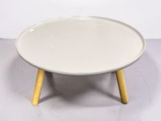 A Scandinavian tripod circular coffee table, diameter 80 cm.