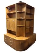 A G-Plan teak three section wall unit, two larger sections each measure 82 cm x 45 cm x 198 cm.