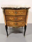 A continental kingwood veneered and satinwood inlaid marble top three drawer chest, width 61 cm.