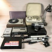 A turntable, cassette player, angle poise lamp, Sony DVD player, a Grundig reel to reel, etc.