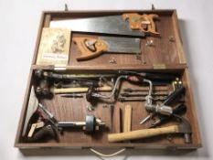A joiner's toolbox containing assorted hand tools including a No.