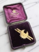 A late Victorian Aesthetic Movement gold bar brooch,