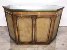 A reproduction mahogany tooled leather inset bar counter, with plate glass top,