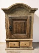 A continental oak single door wall cabinet, width 54 cm.