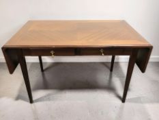 A continental mahogany drop leaf coffee table, extended 130 cm long.