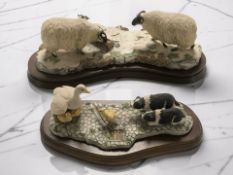 A Border Fine Arts group of border collie puppies with ducklings by D Walton, on plinth,