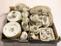A large quantity of KPM porcelain tea and dinner wares, pin dishes, pair of candlesticks, etc.