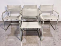 A set of four Scandinavian chrome and stitched grey leather armchairs, each 58 cm wide.