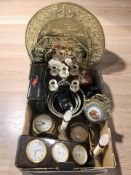 A group of reproduction clocks and barometers, candelabrum, binoculars, various metal wares.