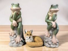A pair of composition frog garden statues, height 76 cm, and a further figure of a fox.