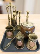 A brass companion set, pair of candlesticks, three various stoneware tankards,