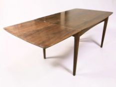 A continental walnut drop leaf extending dining table, overall 175 cm x 83 cm x 76 cm,