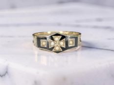 A 19th century enamel and seed pearl mourning ring, size S CONDITION REPORT: 2.