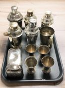 A group of EPNS cocktail shakers, a large hip flask, four beakers, etc.