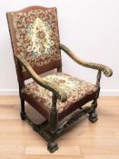 A continental carved beech open armchair, width 70 cm.