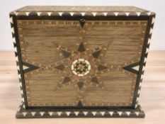 A parquetry cigarette dispenser, width 21 cm.