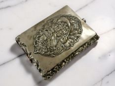 A silver box, decorated in relief with a portrait of an 18th century lady, lined in silk,