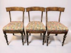 A set of three late 19th century continental walnut occasional chairs.