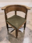 A continental mahogany corner armchair.