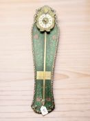 A continental Sawtooth Gravity wall clock, length 60 cm.