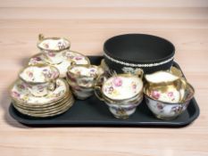 Twenty one pieces of Foley tea china, numbered 2726, decorated with roses,