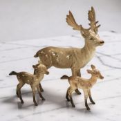 A Beswick stag No. 981, height 20 cm, togethers with two fawns.
