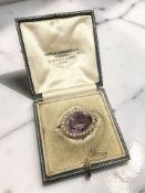 A Victorian amethyst and split pearl brooch, stamped 15ct, width 2.